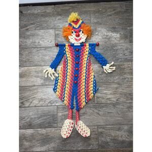handmade vintage macrame clown doll features a colorful spiral-stitch body 1970s